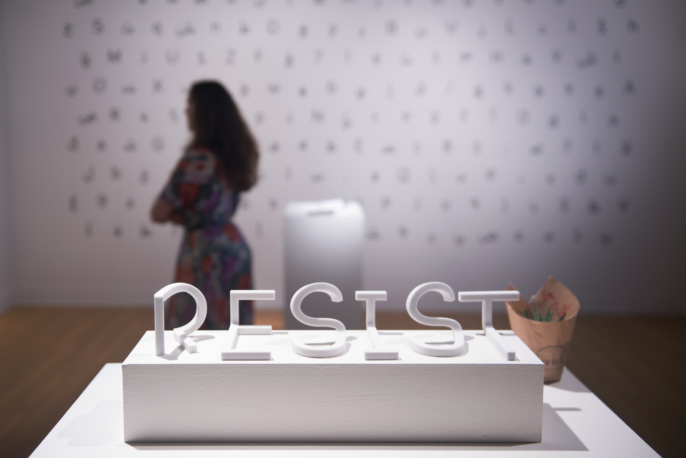 anamorphic 3d letters spelling "resist"